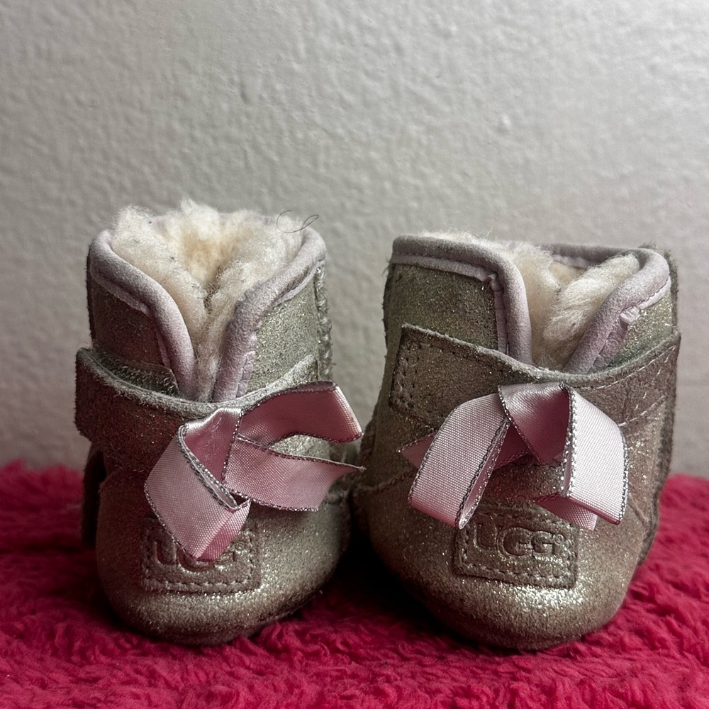 UGG Shimmering Silver Baby Booties with Pink Bows